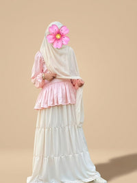 Muslim girl wearing Blush pink silk peplum top with off-white tiered georgette maxi skirt modest co-ord set